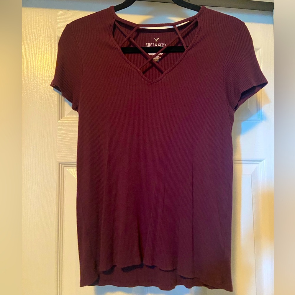American eagle ribbed top with cross detailing. Size medium, lightly worn.